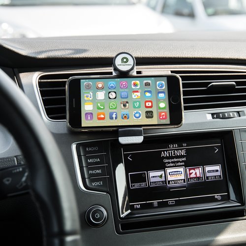 Soporte de plstico negro para telfono mvil para montaje en coche.