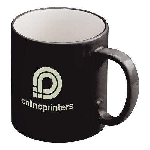 Taza de cermica negra con asa.