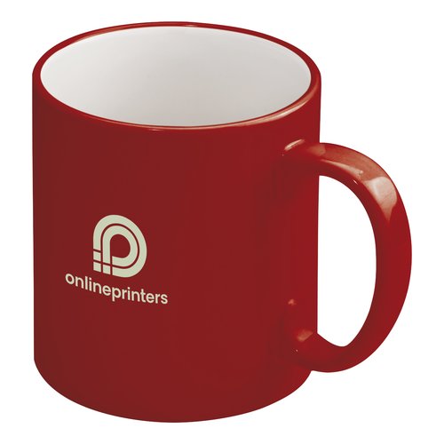 Taza roja de cermica con asa.