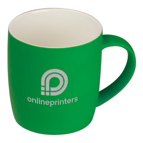 Taza de cermica verde con bordes redondeados y asa.