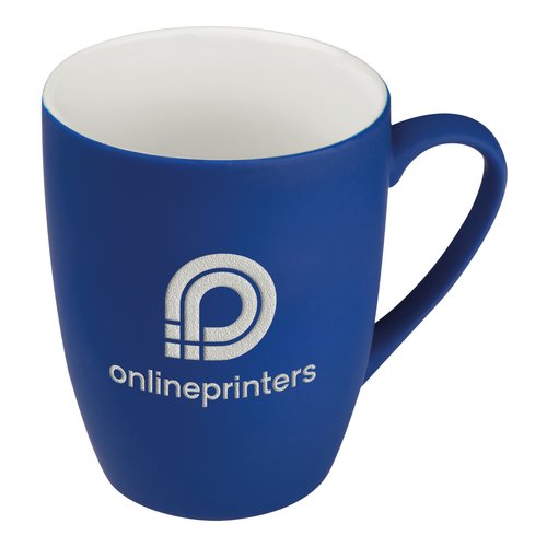 Taza de cermica azul con asa.