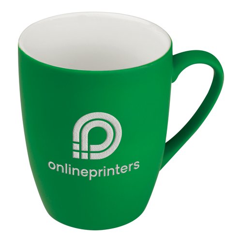 Taza de cermica verde con diseo redondeado y asa.