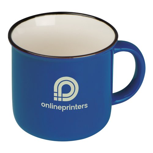 Taza de cermica azul con aspecto retro y asa.