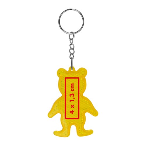 Llavero amarillo con forma de oso y anilla de metal.