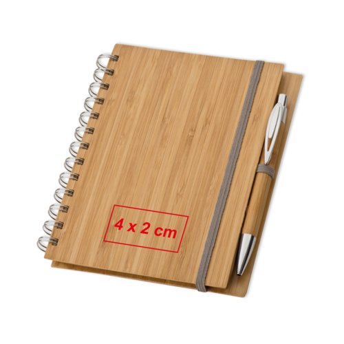 Cuaderno de madera clara con encuadernacin en espiral y soporte para bolgrafo.