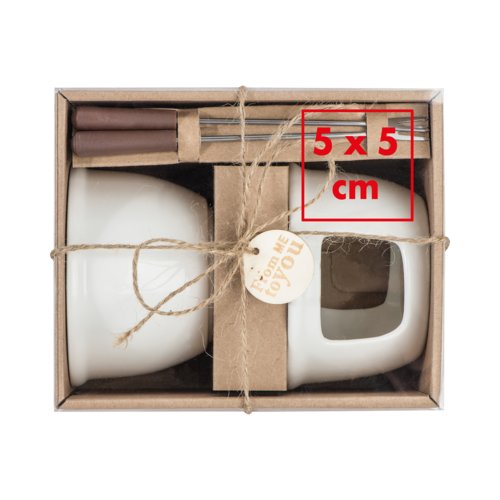 Set de fondue de chocolate de cermica blanca con tenedores.