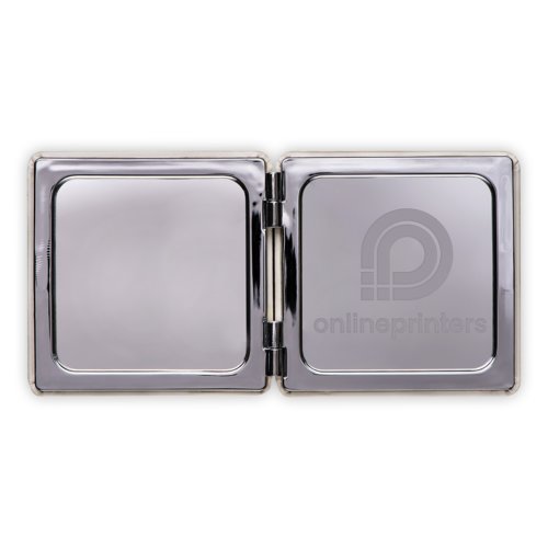 Espejo de aumento plateado plegable.