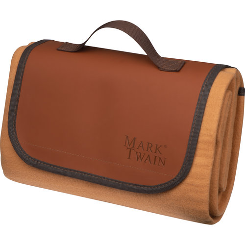 Manta de picnic beige con asa de transporte e inferior impermeable.
