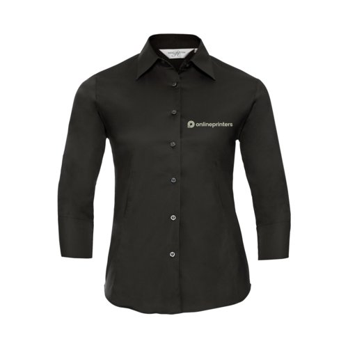 Blusa negra con mangas largas y tapeta de botones.