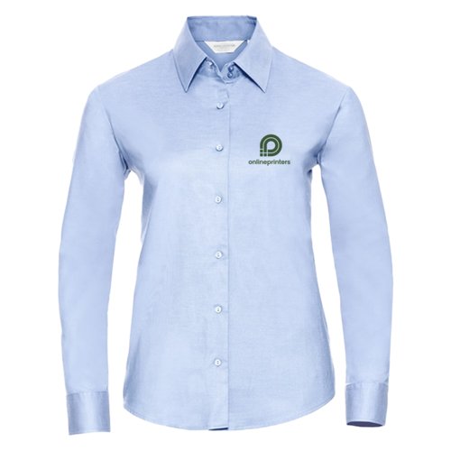 Camisa Oxford azul claro para mujer con mangas largas y tapeta de botones.