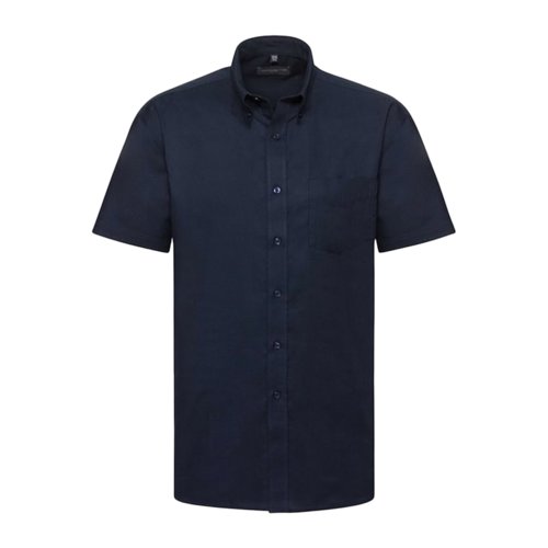 Camisa azul marino de manga corta en algodn y polister con tapeta de botones y bolsillo en el pecho.