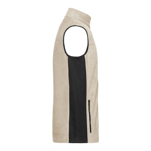 Chaleco polar de polister beige/negro con bolsillo con cremallera.