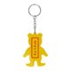 Llavero amarillo con forma de oso y anilla de metal.