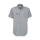Camisa de manga corta en mezcla de algodn gris claro con tapeta de botones y bolsillo en el pecho.