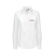 Blusa blanca de mujer en mezcla de algodn con mangas largas.