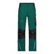 Pantaln de trabajo verde oscuro/negro de polister y algodn con bolsillos.