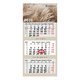 Calendario mensual de papel con varios bloques.